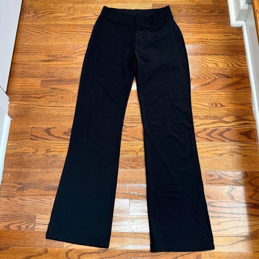 Peak Performance Women’s Stretch Jersey Flare T Pants. Black. Large.